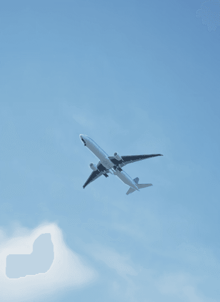 Airplane in flight representing global deployment